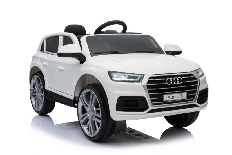 White toy Audi Q5 with open top, front grille and oversized wheels on a white background.