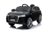 Scale-model black Audi Q5 toy car on a white studio background.