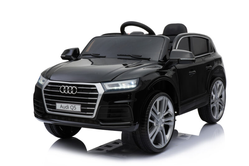 Scale-model black Audi Q5 toy car on a white studio background.