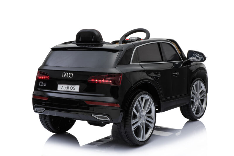 Black Audi Q5 children's ride-on toy car, rear and side view with red taillights and large alloy wheels