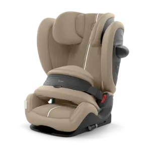 Beige padded child car seat with head support, side wings, and a five-point harness system ready for installation