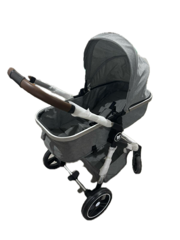 Gray baby stroller with a sun canopy, padded seat, and four wheels on a frame.