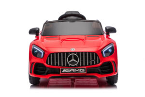 Front-facing red Mercedes AMG toy car with black grille and emblem on a white background. Designed to resemble a modern SUV with glossy finish.