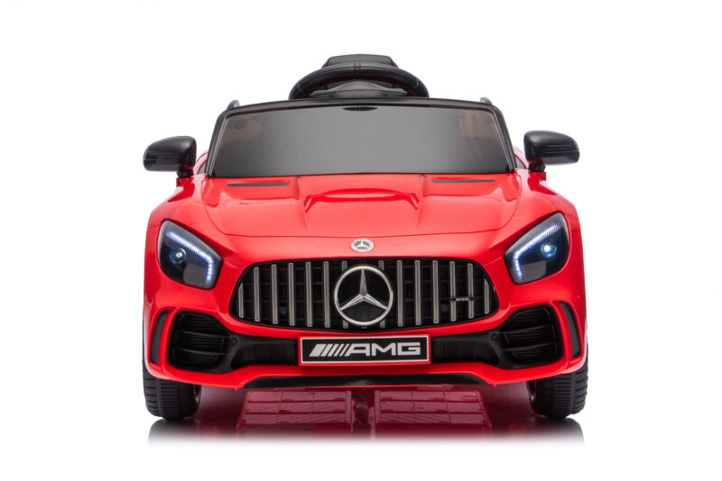 Front-facing red Mercedes AMG toy car with black grille and emblem on a white background. Designed to resemble a modern SUV with glossy finish.