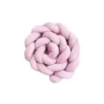 Light pink braided fabric knot pillow, a decorative circular cushion.