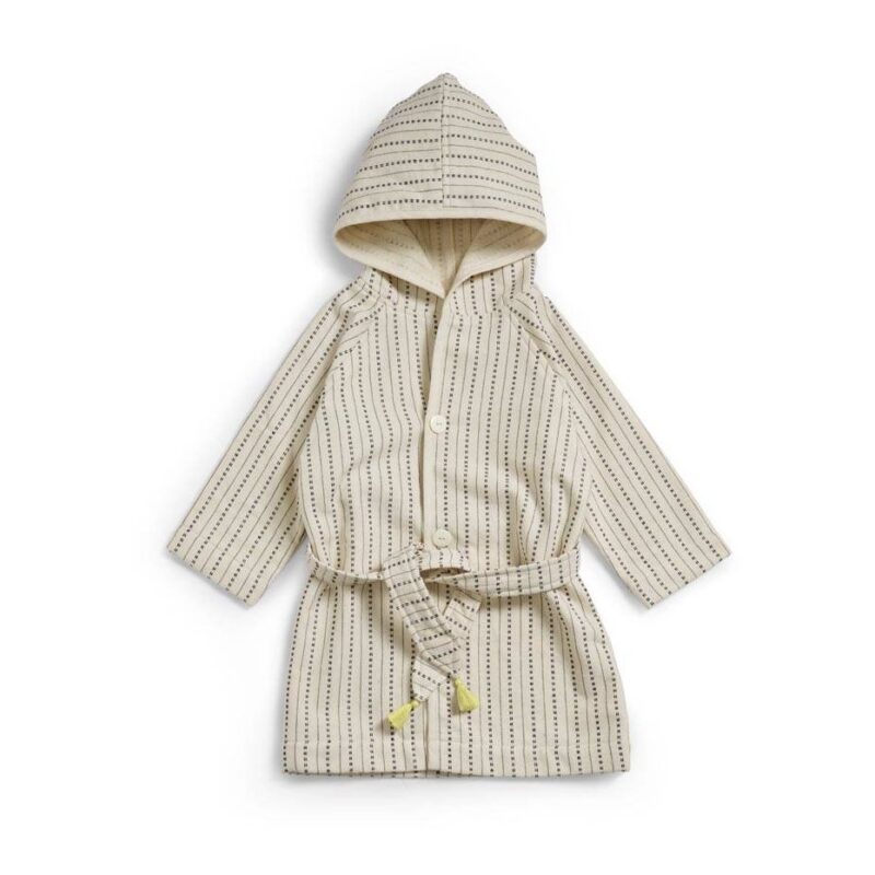 Cream-colored striped hooded bathrobe with a belt and tassel-tinished cords, laid flat.