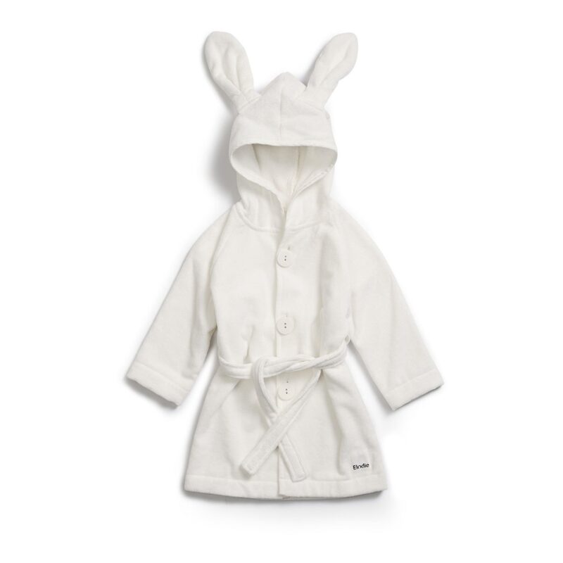 White hooded bathrobe for a child with bunny-ear hood, fastened with buttons and a tied belt.