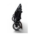 Folded black baby stroller with large rear wheels, ready for storage.