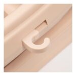 Close-up of a white hook-shaped latch on a beige window blind track.