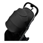 Black infant stroller with a bassinet attachment, shown from a high side angle.