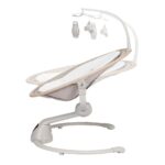 Baby bouncer/rocker with a curved stand, beige seat, and a detachable overhead mobile with hanging animal shapes.