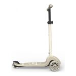 Beige two-wheeled kick scooter with a tall vertical handlebar on a white background, shown in profile.