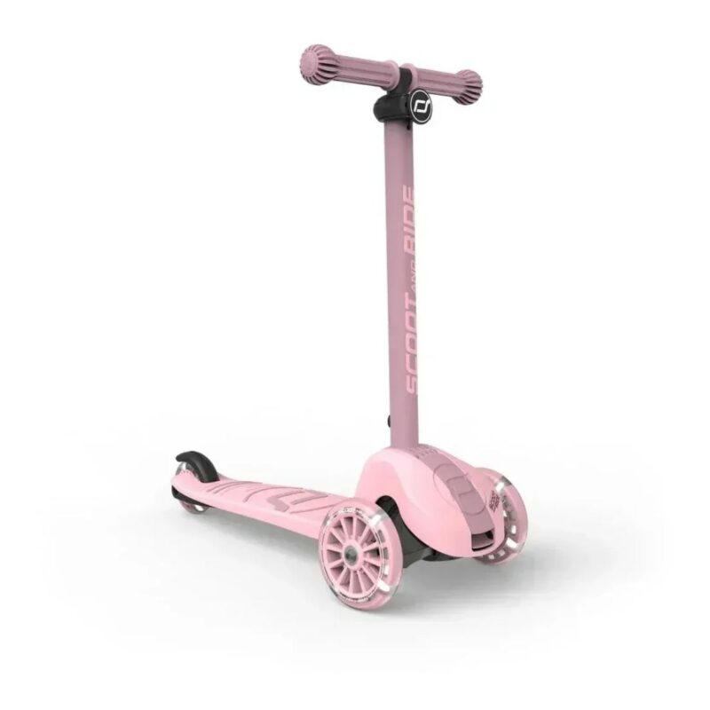 Pink three-wheeled children's scooter with a tall handlebar and wide deck (side view). I