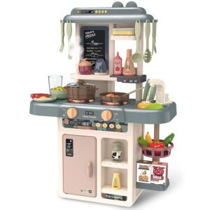 Colorful children's toy kitchen set with two stoves, oven, shelves, and hanging utensils; includes pretend food, condiments, and a fruit basket on the side.