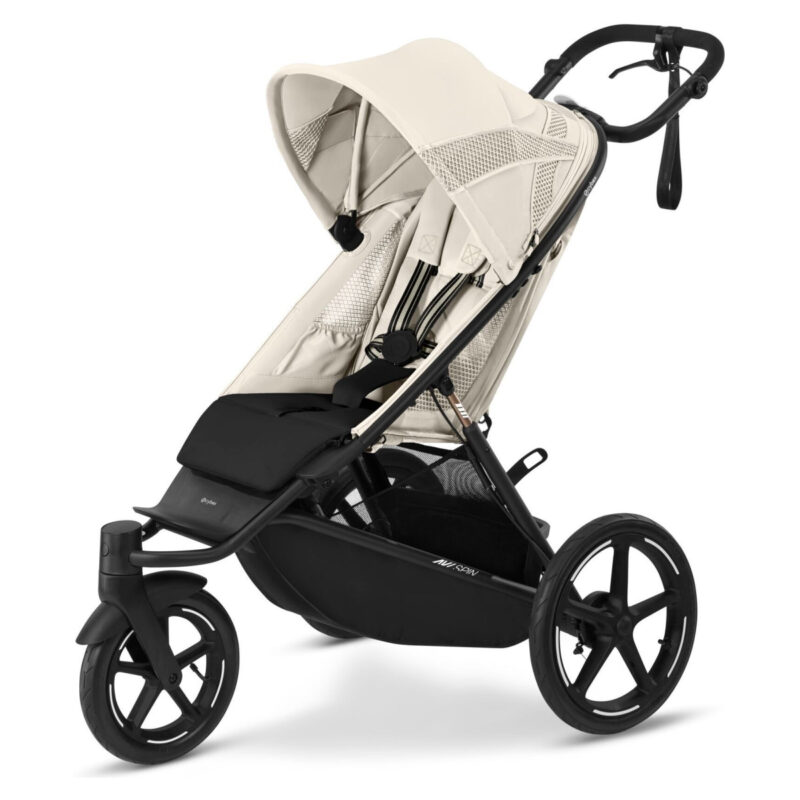 Beige baby stroller with sun canopy and black frame, featuring a storage basket underneath and large wheels.