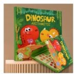 Bright green dinosaur arithmetic game box titled 'Dinosaur Arithmetic' with playful dinosaur illustrations, shown with a fold-out game board on a beige background.