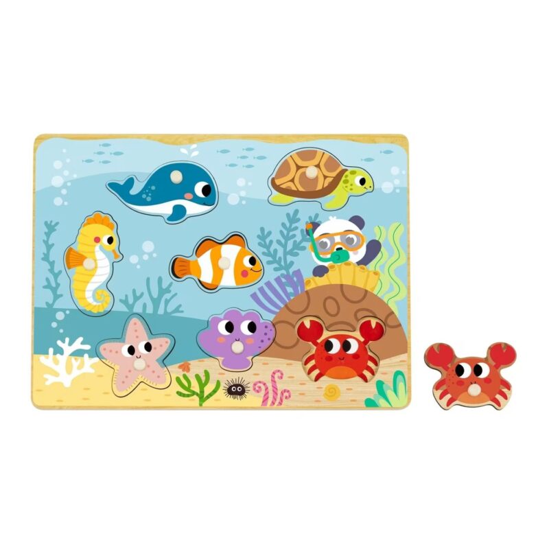 Colorful underwater puzzle scene with fish, seahorse, turtle, coral, and a smiling crab piece nearby.
