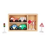 Wooden toy vehicles set with fire truck, ambulance, police car, and recycling truck in a cubby shelf, plus stop sign and railroad crossing signs on the side.