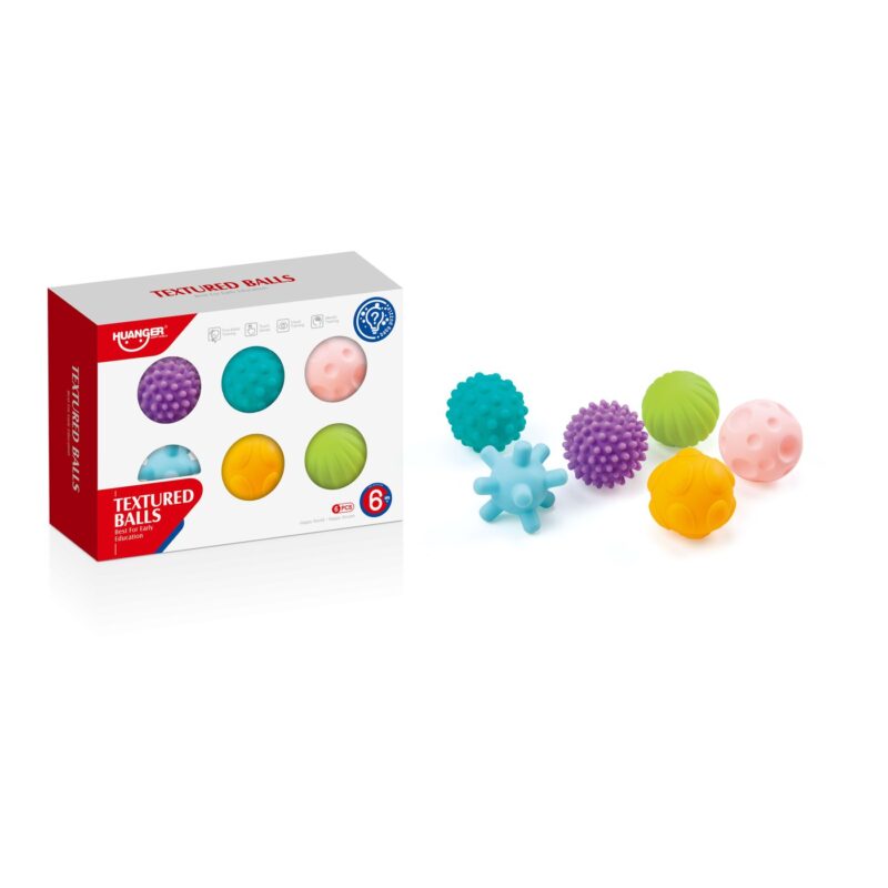 Boxed set labeled Textured Balls with six colorful textured balls and several loose balls on a white surface.
