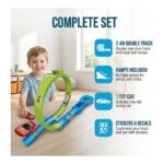 Child plays with a green looping toy car track; showcases a complete set with double track, ramps, one car, and stickers.