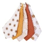 Set of five baby swaddle blankets laid side by side, with sun patterns in white, mustard, beige, rust, and cream.