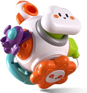 Colorful children's toy robot with a white head, orange cheeks, purple claw-like arms, and teal accents, shown in a dynamic pose.