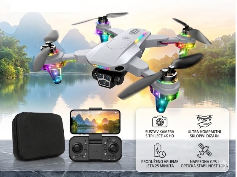 Quadcopter drone with four propellers and colorful LEDs hovering above a lake, remote controller and smartphone showing the camera view, plus a black carry case nearby.