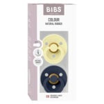 Boxed BIBS Colour natural rubber pacifiers in cream and navy, showing size 1 and Danish design origin