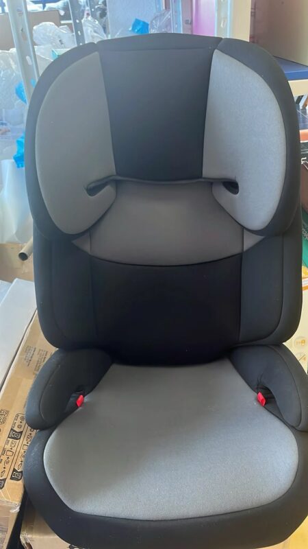 Grey and black child car seat with padded headrest and side supports, displayed in a store setting